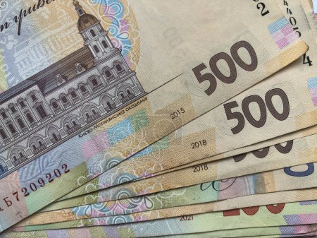 Background made of hryvnia banknotes. Ukrainian money. A bill in a Five hundred hryvnia, one hundred hryvnia.