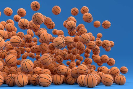 Téléchargez les photos : Beaucoup de ballon de basket-ball orange volant tombant sur fond bleu. 3d rendu d'accessoires de sport pour les jeux d'équipe, l'exercice et la compétition - en image libre de droit