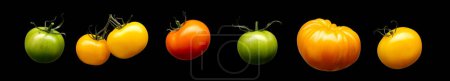 Tomatenset vorhanden. Orangen und Äpfel isoliert auf schwarzem Hintergrund mit Schnittpfad