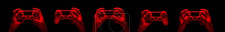 Hyman mains tenant manette de jeu vidéo dans des néons isolés sur fond noir
