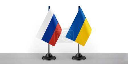 Image of the table flag of Russia and Ukraine countries. White background, close-up flags.