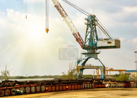 Photo for About the tower crane at the construction site and blue sky by emphasizing the tower crane - Royalty Free Image