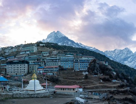 A High Angle View of Namche Bazaar in the valley with mountains all around.