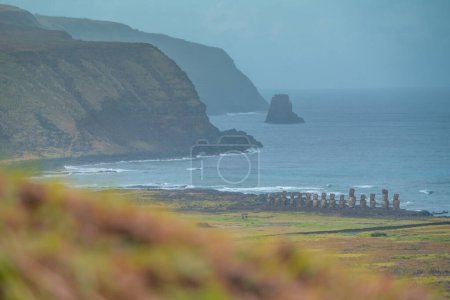 View from the Moai factory on Easter Island or Rapa Nui over the surroundings. Very green. Bad weather.