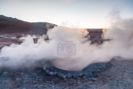 Steaming geysers Sol de Manana in Bolivia near Uyuni and Laguna Colorado - Sunset. High quality photo
