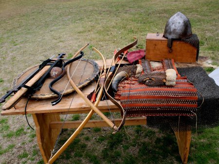Medieval equipment laid out on the table, still life
