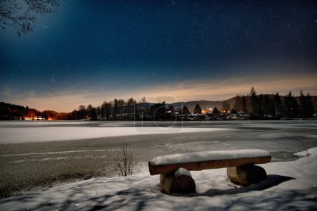 bench in the winter in the night