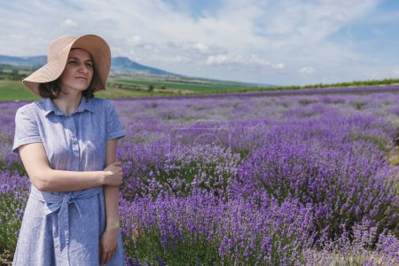 Young women in the lavender field. High quality photo