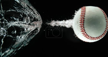 Photo for Baseball's Ball Falling into Water against White background - Royalty Free Image