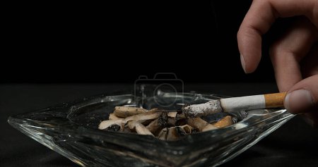 Photo for Hand of Woman with Cigarette - Royalty Free Image