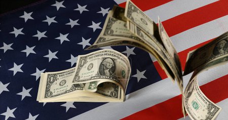 Photo for 1 US Dollar Banknotes Flying on American Flag - Royalty Free Image