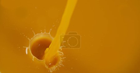 Photo for Orange Juice being poured - Royalty Free Image