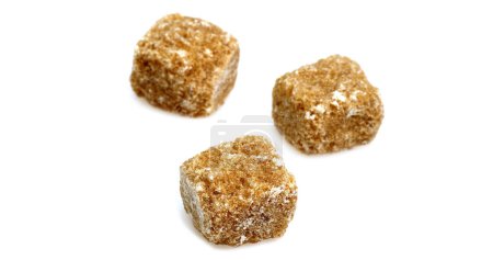 Photo for Brown Cube Sugar against White Background - Royalty Free Image