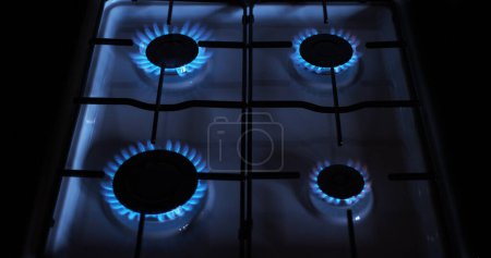 Foto de Quemadores de estufa de gas, llama azul - Imagen libre de derechos
