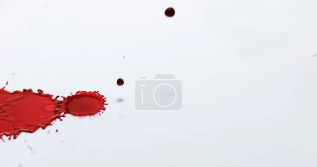 Photo for Blood Dripping against White Background - Royalty Free Image