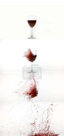 Photo for Glass of Red Wine Breaking and Splashing against White Background - Royalty Free Image