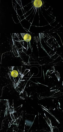 Téléchargez les photos : Volet de rupture de balle de tennis de verre sur fond noir - en image libre de droit