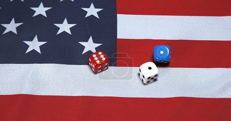 Photo for Dice rolling on American Flag - Royalty Free Image