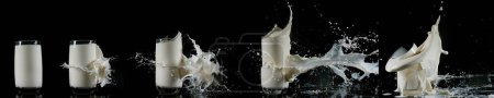 Téléchargez les photos : Verre de lait explosant sur fond blanc - en image libre de droit