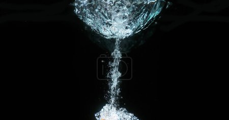 Photo for Bubbles of Air in the Water on Black Background - Royalty Free Image