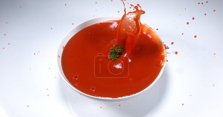 Photo for Cherry Tomatoe, solanum lycopersicum, Fruit falling into tomatoe's Juice - Royalty Free Image
