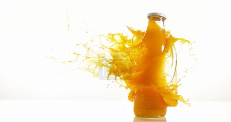 Photo for Bottle of Orange Exploding against White Background - Royalty Free Image