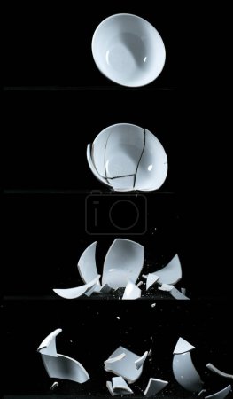 Photo for Bowl falling and exploding on Black Background - Royalty Free Image