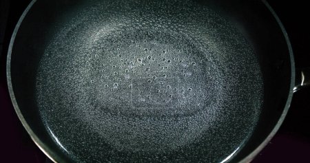 Photo for Hot Boiling Water in a saucepan - Royalty Free Image