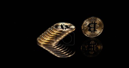 Foto de Bitcoins on Black Background. Bitcoins sobre fondo negro - Imagen libre de derechos