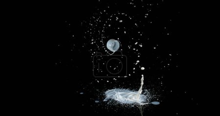 Photo for Glass of Milk Bouncing and Splashing on Black Background - Royalty Free Image