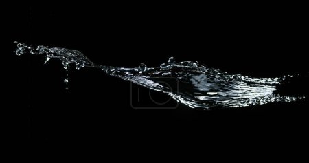 Photo for Water spurting out ans Splashing against Black Background - Royalty Free Image