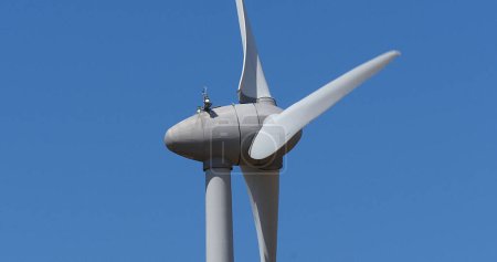 Photo for Wind Turbines with Blue Sky, near Caen in Normandy in France - Royalty Free Image