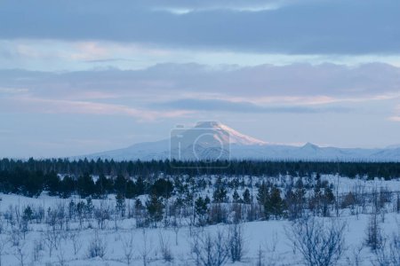 Snowy Mountain Range Under a Clear Winter Sky