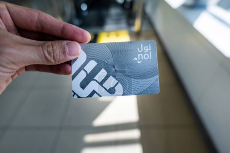 Photo for Dubai, UAE - October 2022: NOL card in Dubai. Nol Card is an electronic ticketing card for Dubai Metro, the world's longest fully automated metro - Royalty Free Image