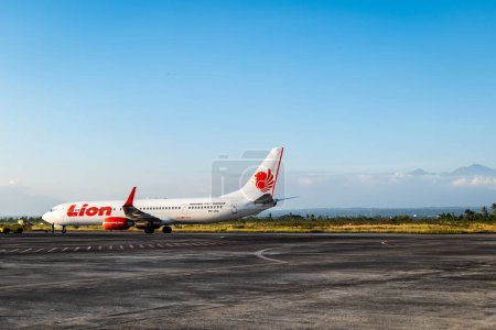 Photo for Lombok, Indonesia - 09.03.2023: Lion Air aircraft at Lombok International Airport, Indonesia. Lion Air is the Indonesias largest privately run airline - Royalty Free Image