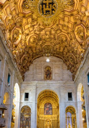 Photo for Interior of a historic baroque church in Salvador, Bahia, richly decorated with gold-plated walls and altar - Royalty Free Image