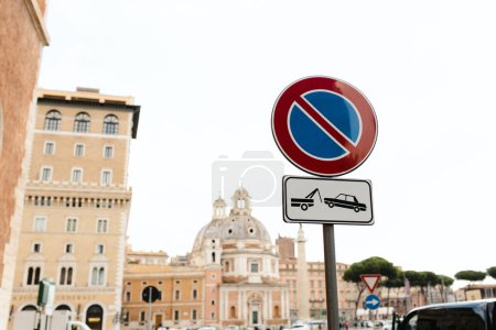 No Parking Traffic Sign on urban background, Rome, Italy. Traffic means the traffic that used to control traffic