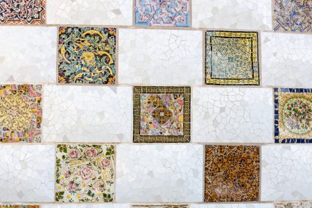Colorful mosaic tiles at Guell Park. Broken tiles mosaic pattern. UNESCO World Heritage Site, Barcelona