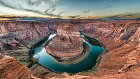 Photo for Horseshoe Bend, Page, AZ, is a stunning horseshoe-shaped meander of the Colorado River. This iconic natural wonder, part of the Glen Canyon National Recreation Area, offers breathtaking views. - Royalty Free Image