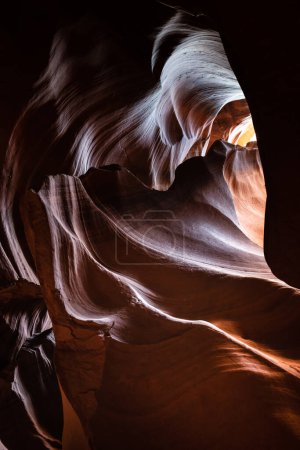 Upper Antelope Canyon, near Page, Arizona, is a breathtaking slot canyon known for its narrow passageways and vibrant sandstone walls.