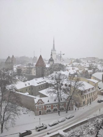 A stunning snowy view of Tallinn, Estonia, capturing the city's enchanting winter atmosphere.