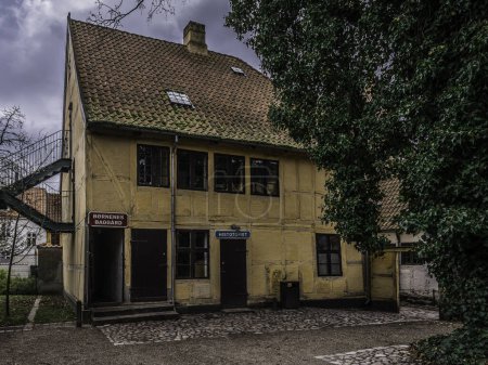 Photo for Ancient half-timberde house at Montergarden in Odense, Denmark, April 19, 2024 - Royalty Free Image