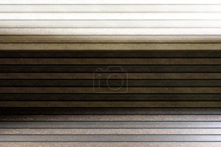 Background with a striped pattern composed of white and gray colors. The stripes are spaced close together, creating a dramatic look and adding depth and texture to the overall design