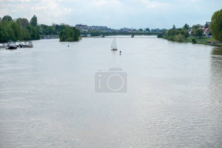 Photo for River with sailboat and cityscap - Royalty Free Image