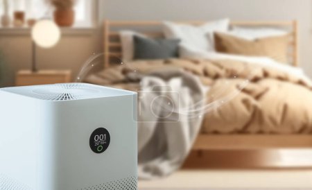 Photo for Air purifier a bed room,  air cleaner removing fine dust in house. protect PM 2.5 dust and air pollution concept - Royalty Free Image