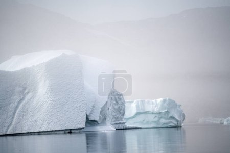 Photo for Arctic icebergs are melting on arctic ocean in greenland - Royalty Free Image