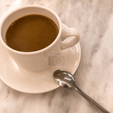 Photo for Photo cup of coffee on the table, morning coffee in cafe, coffee overlooking the sea - Royalty Free Image