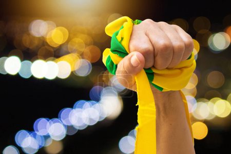 Photo for Mature Woman Holding Brazil Flag on Cinematic Background. For social media with copy space. - Royalty Free Image