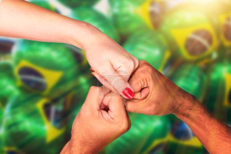 Photo for Brazilian Fans, Multiethnic Hands Shaking on Cinematic Background. For social media with copy space. - Royalty Free Image
