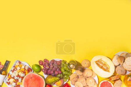 Photo for Buon Ferragosto (happy in italian language) holiday background. Summer Italian harvest festival August 15  brunch, family party antipasto foods with watermelon, melon, grapes, cheese, snacks, drinks - Royalty Free Image